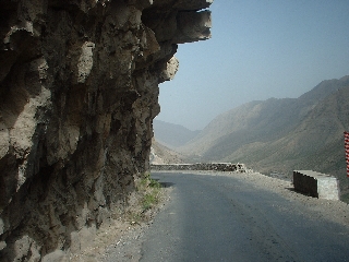 single lane road in mountains  